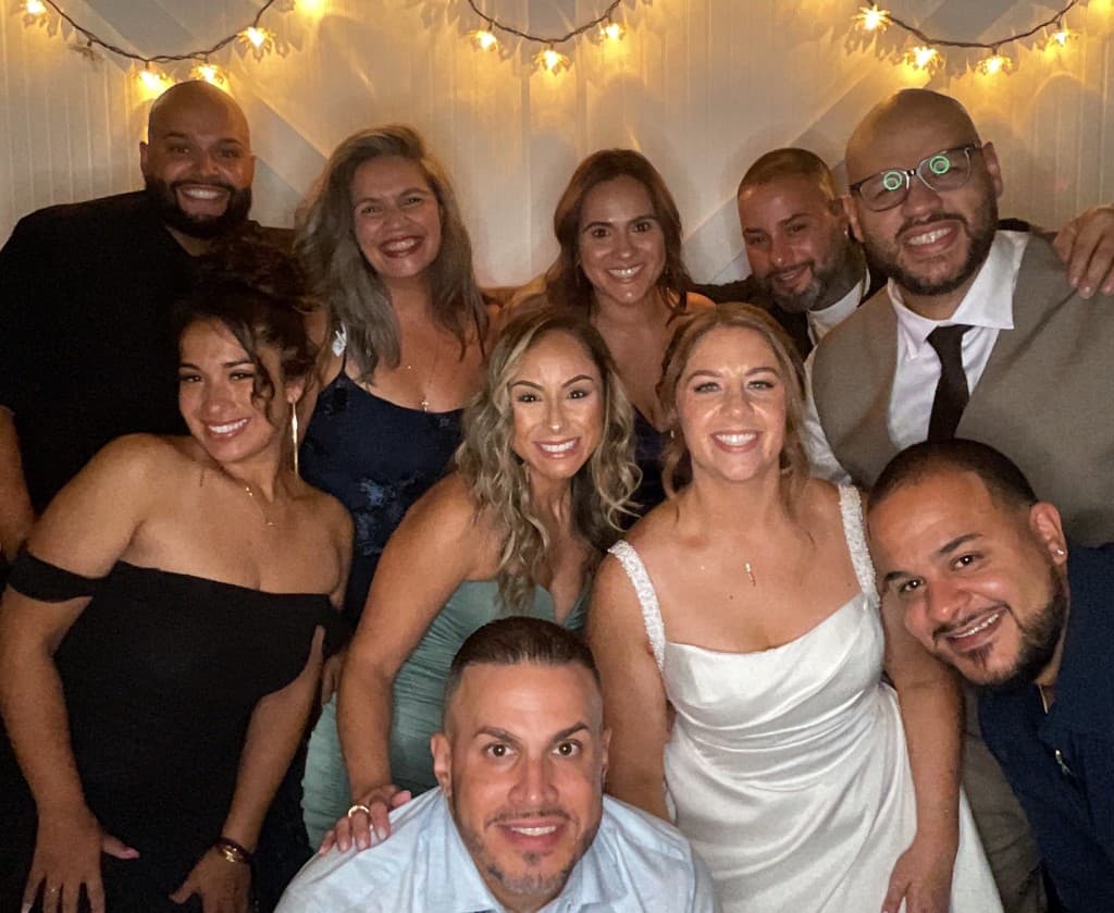 Wedding reception group photo with the bride